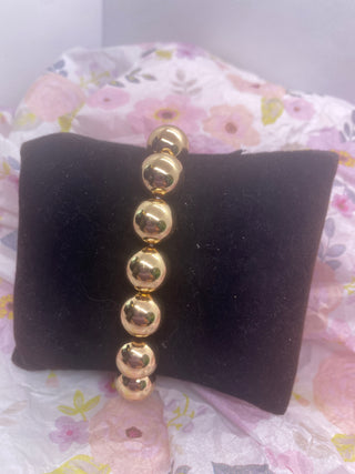 Shiny Gold Tone Stretch Ball Bracelet