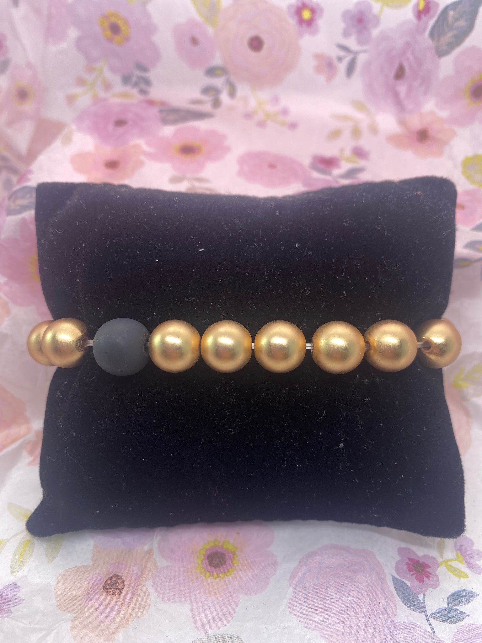 Large Gold Tone Stretch Bracelet w Black Clay Bead