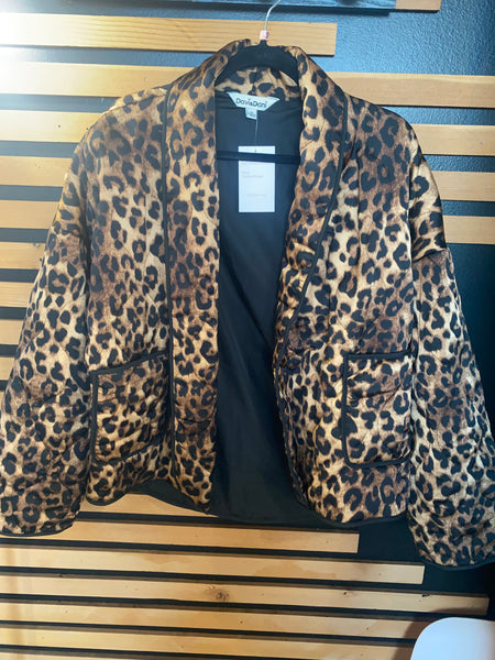 Leopard print jacket on a striped surface