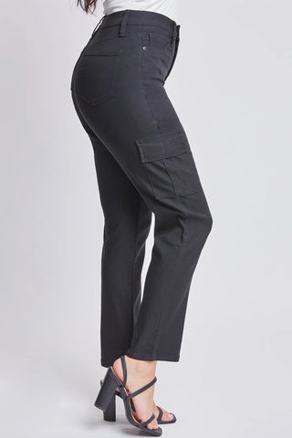 Person wearing black cargo pants on a white background
