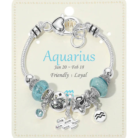 Bracelet with charms on a card labeled 'Aquarius' with details about the zodiac sign.
