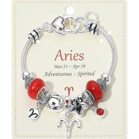 Bracelet with Aries-themed charms on a display card