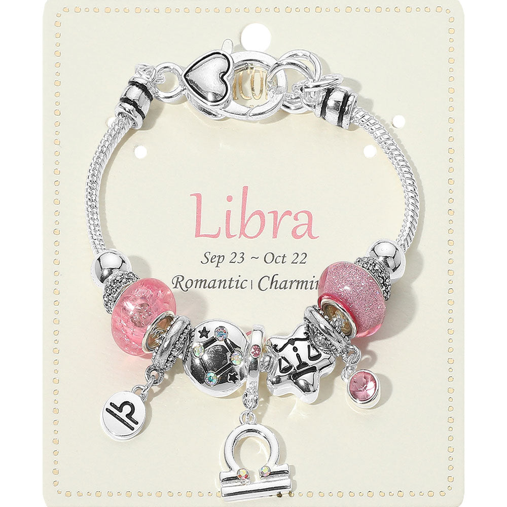 Bracelet with Libra charm on a branded card