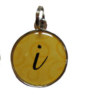 Five round pendants with letter 'i' on a white background