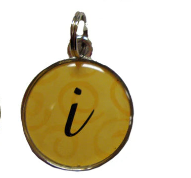 Five round pendants with letter 'i' on a white background
