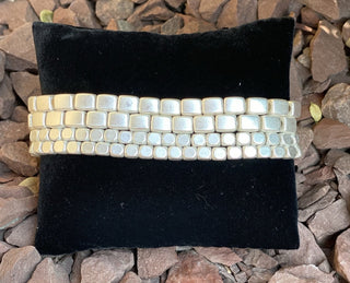 Four Strand Silver Tone Stretch Bracelet