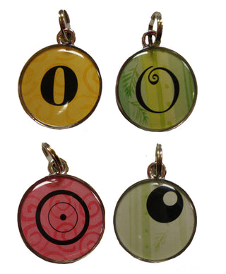 Three round charms with 'O' initial in the center, displayed in yellow, green, and red colors, attached to a chain.